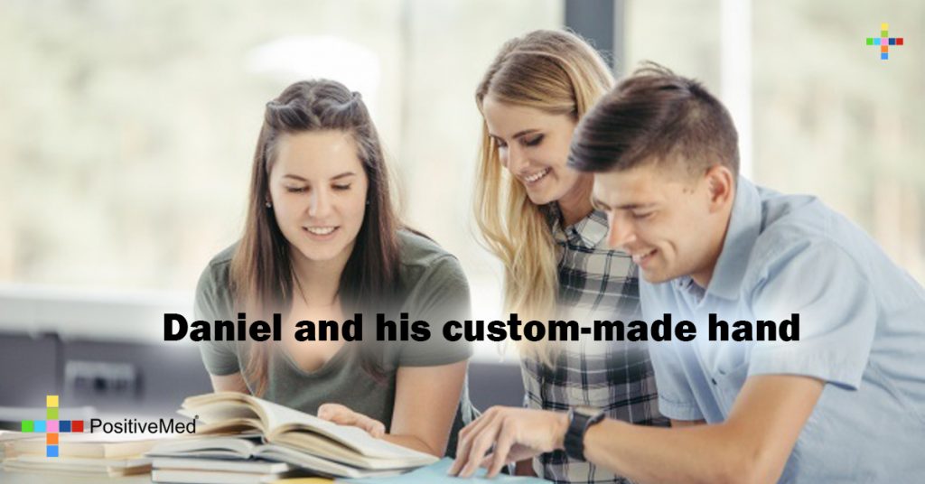 Daniel and his custom-made hand